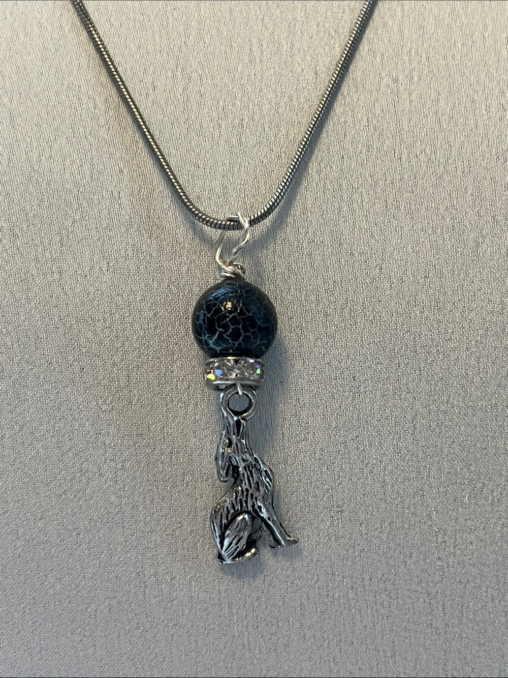 Silver Wolf Pendant Necklace with Black Crackle Bead